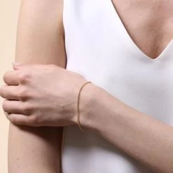 Yellow Gold Plated Sterling Silver 1.5mm Ball Bead Link Bracelet -Fashion Accessories Store gold plated sterling silver ball bead bracelet fem model close view tchygbrbd15 2000q6