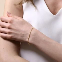 Yellow Gold Plated Sterling Silver 2mm Ball Bead Link Bracelet -Fashion Accessories Store gold plated sterling silver ball bead bracelet fem model close view tchygbrbd2 2000q6