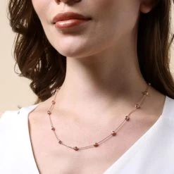 9ct Rose Gold Plated Sterling Silver Oval Beaded Diamond Cut Trace Chain Necklace 9 9ct Rose Gold Plated Sterling Silver Oval Beaded Diamond Cut Trace Chain Necklace -Fashion Accessories Store gold plated sterling silver oval bead chain female model close view tchr fzobd 2000q6