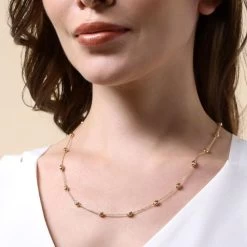 9ct Yellow Gold Plated Sterling Silver Oval Beaded Diamond Cut Trace Chain Necklace -Fashion Accessories Store gold plated sterling silver oval bead chain female model close view tchy fzobd 2000q6