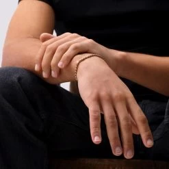 9ct Yellow Gold Plated Sterling Silver 3.3mm Diamond Cut Rope Bracelet -Fashion Accessories Store gold plated sterling silver rope chain male model close view tchygbrro33 2000q6