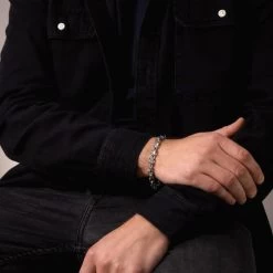 Sterling Silver 7mm Anchor Bracelet Diamond Cut -Fashion Accessories Store sterling silver anchor bracelet male model far view tchbr antr70 2000q6