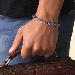 Sterling Silver 6.8mm Round Byzantine Bracelet -Fashion Accessories Store sterling silver byzantine bracelet male model far view tchbr byzr68 0423 2000q6 1