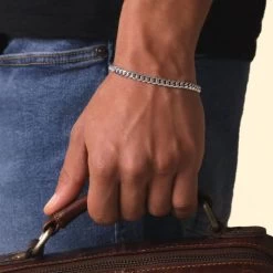 Sterling Silver 5.6mm Diamond Cut Cuban Bracelet 7 Sterling Silver 5.6mm Diamond Cut Cuban Bracelet -Fashion Accessories Store sterling silver cuban bracelet male model far view tchbrcbn56 0423 2000q6