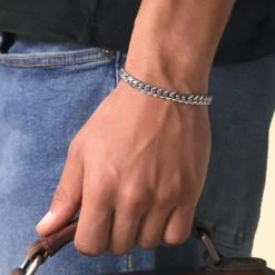 Sterling Silver 7mm Diamond Cut Cuban Bracelet -Fashion Accessories Store sterling silver cuban bracelet male model far view tchbrcbn7 0423 2000q6