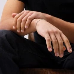 Sterling Silver 2.4mm Diamond Cut Curb Link Bracelet -Fashion Accessories Store sterling silver curb bracelet male model close view tchbrcb24 2000q6