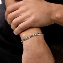 Sterling Silver 5.4mm Diamond Cut Curb Link Bracelet -Fashion Accessories Store sterling silver curb bracelet male model far view tchbrcu54 2000q6