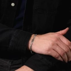 Sterling Silver 5.7mm Diamond Cut Figaro Link Bracelet -Fashion Accessories Store sterling silver figaro bracelet male model close view tchbrfg57 2000q6