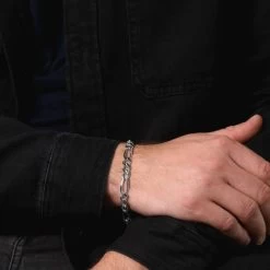 Sterling Silver 7.6mm Diamond Cut Figaro Link Bracelet 7 Sterling Silver 7.6mm Diamond Cut Figaro Link Bracelet -Fashion Accessories Store sterling silver figaro bracelet male model close view tchbrfg76 2000q6