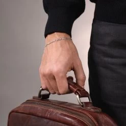 Sterling Silver 3mm Diamond Cut Figaro Link Bracelet -Fashion Accessories Store sterling silver figaro bracelet male model far view tchbrfg3 2000q6