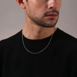 Sterling Silver 1.9mm Snake Chain Necklace 15 Sterling Silver 1.9mm Snake Chain Necklace -Fashion Accessories Store sterling silver snake chain male model close view tchrsn19 2000q6